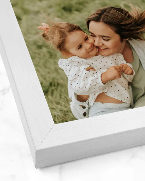 Cornice in legno bianca