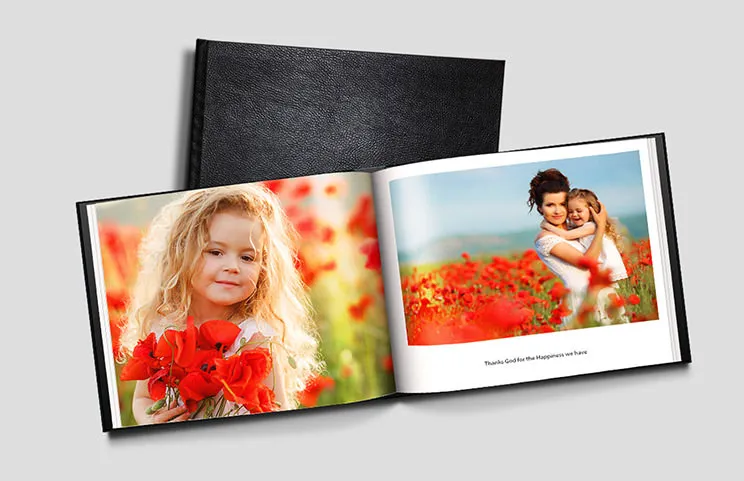 Libro fotografico personalizzato di Printerpix con copertina in pelle e design personalizzato