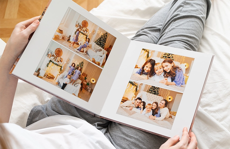 Album fotografico personalizzato con immagini romantiche di una coppia e copertina fotografica